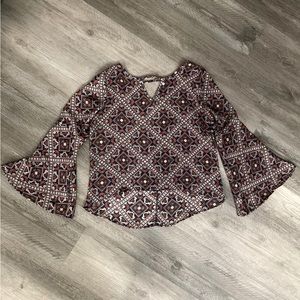 Chic Happens patterned bell sleeve blouse